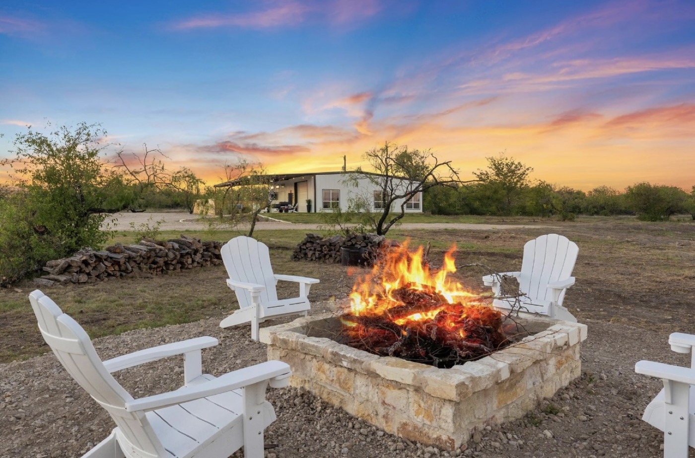 Custom stone firepit and outdoor living space